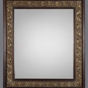 A mirror with gold leaf frame and white background.